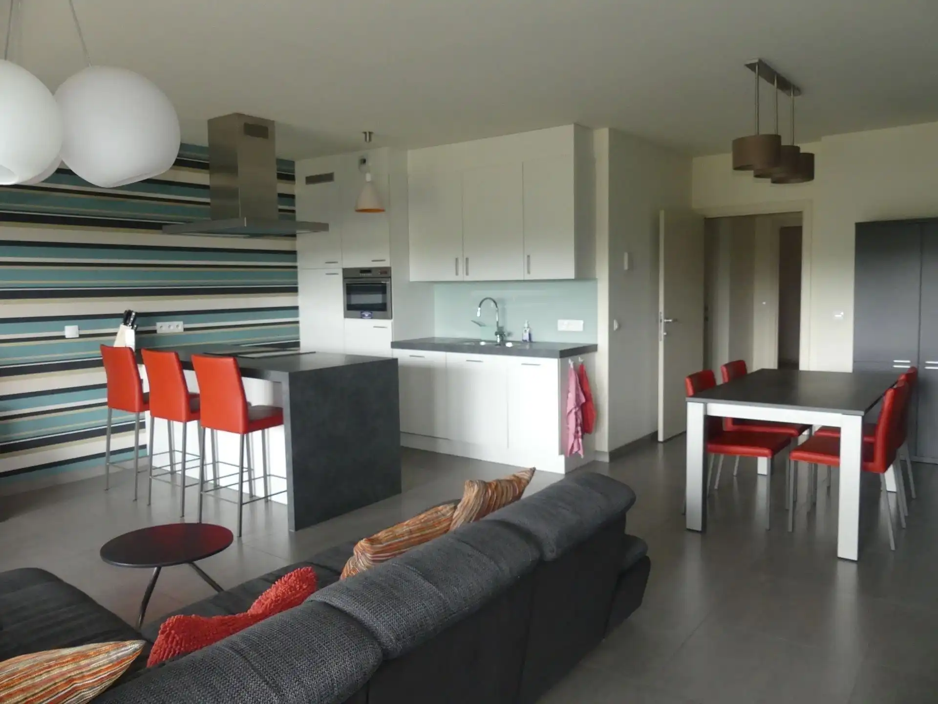 Instapklaar gelijkvloers appartement met zonnige tuin en uniek zicht op het water! foto 3