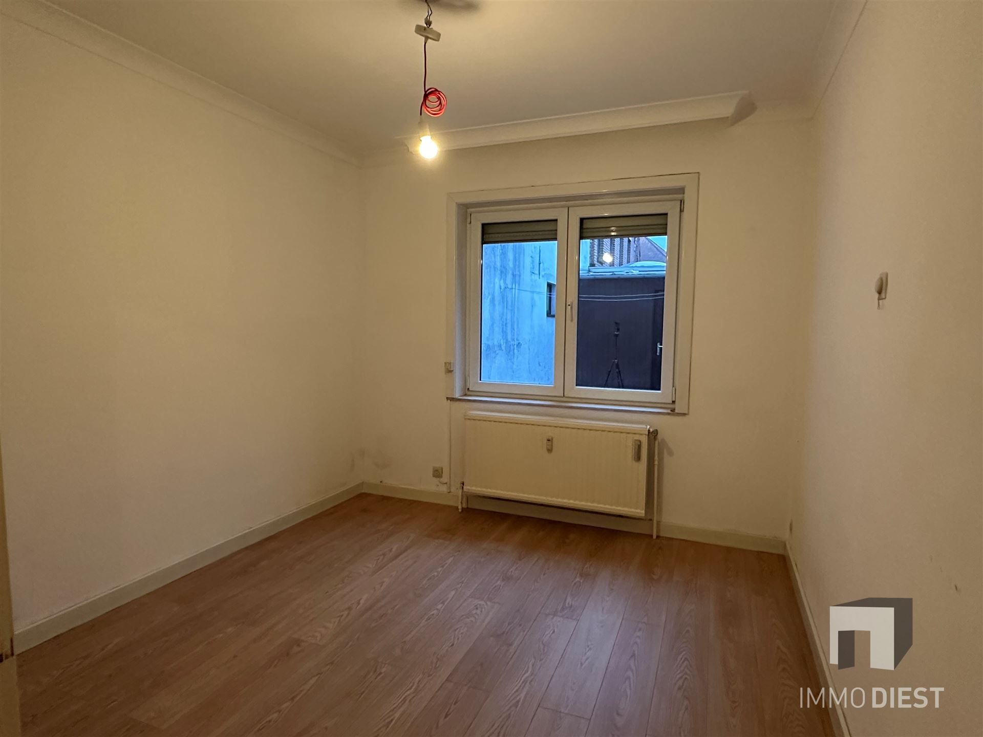 Gelijkvloers appartement met koer en 2 ruime slaapkamers foto 12