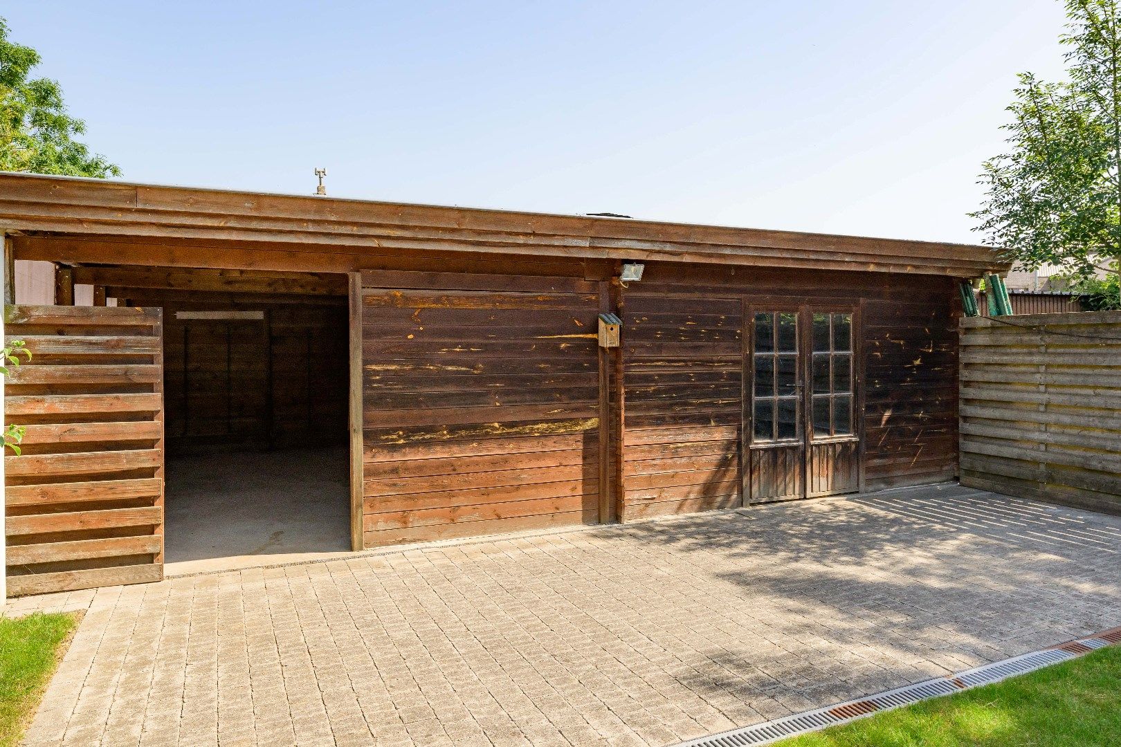 PRACHTIGE HERENWONING MET TUIN | GARAGES & TOEGANG ACHTEROM foto 3