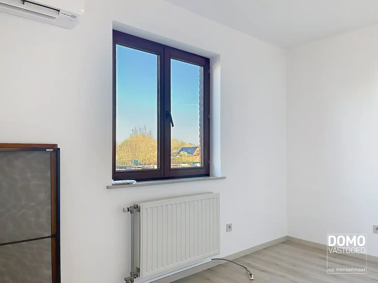 LICHTRIJK APPARTEMENT MET 2 SLAAPKAMERS EN GARAGEBOX foto 9