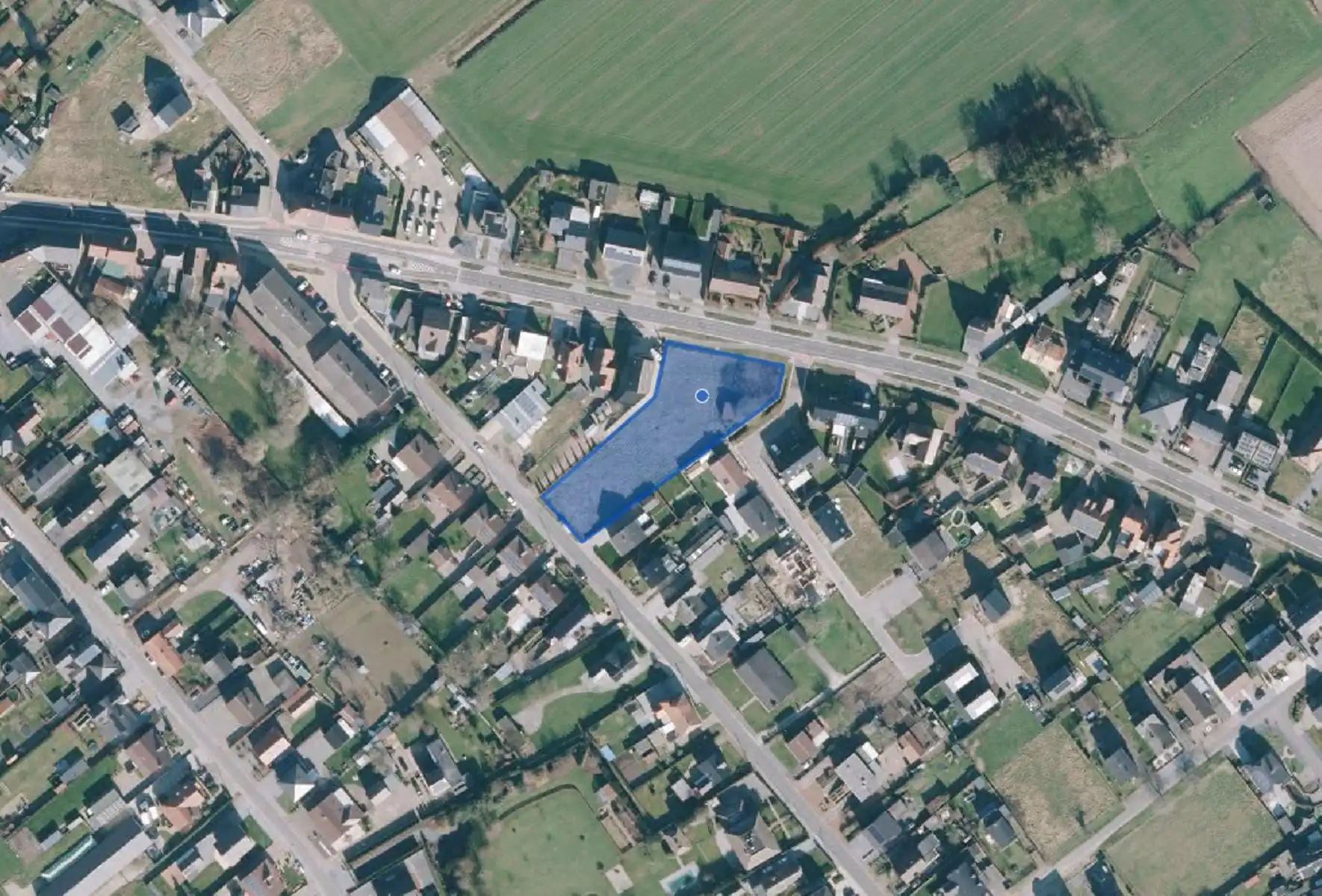 Projectgrond van 28a 89ca vlakbij centrum Opitter.  foto {{pictureIndex}}