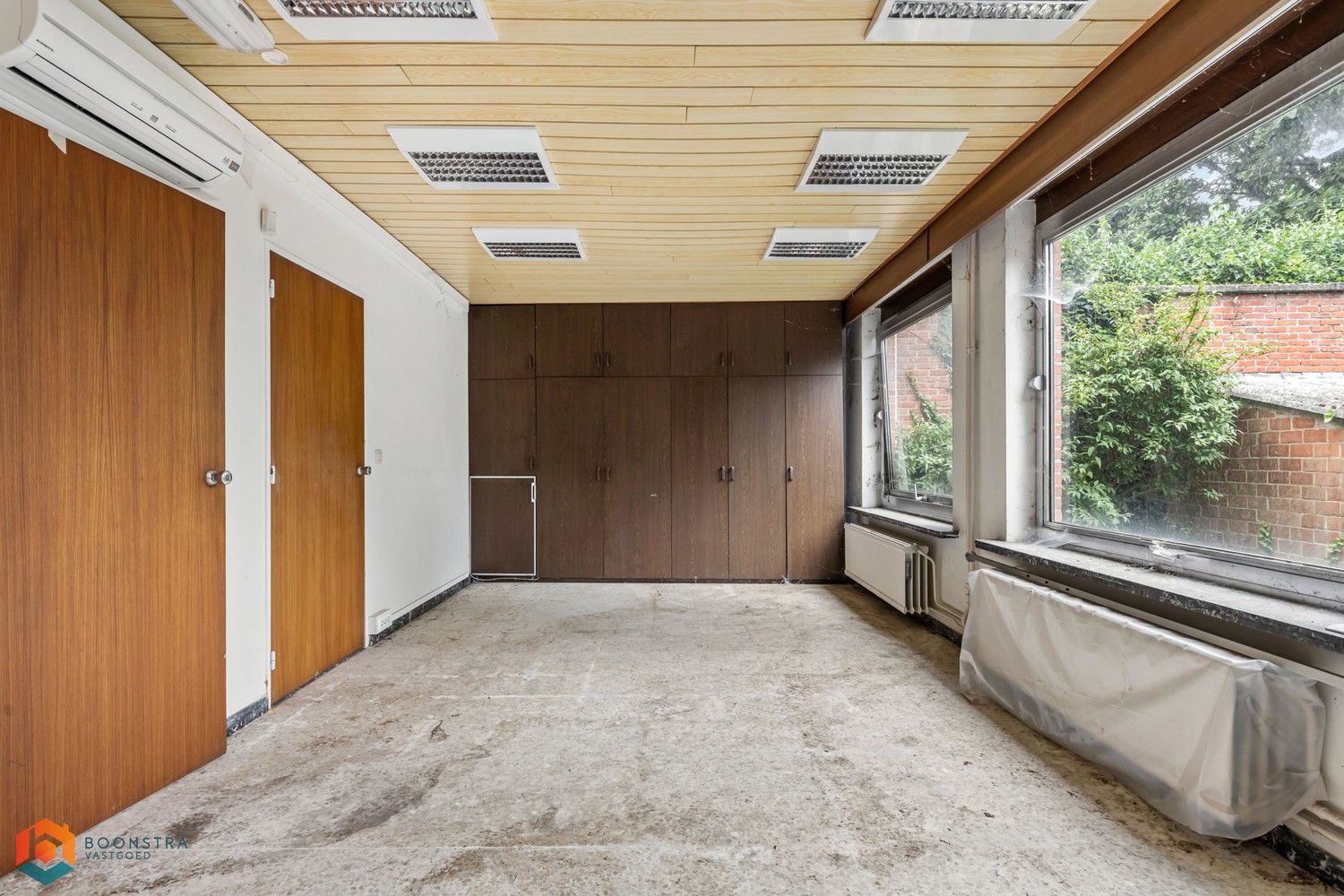 Handelsgelijkvloers met woonst en gezellige tuin in centrum Putte foto 23