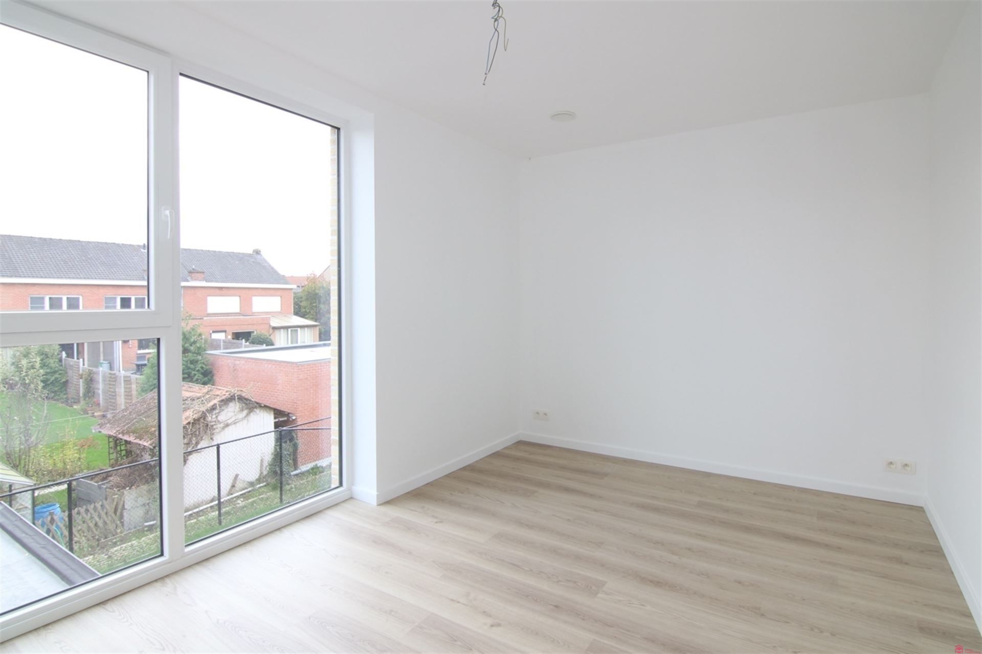 Energiezuinige woning te huur nabij het centrum van Wevelgem foto 11