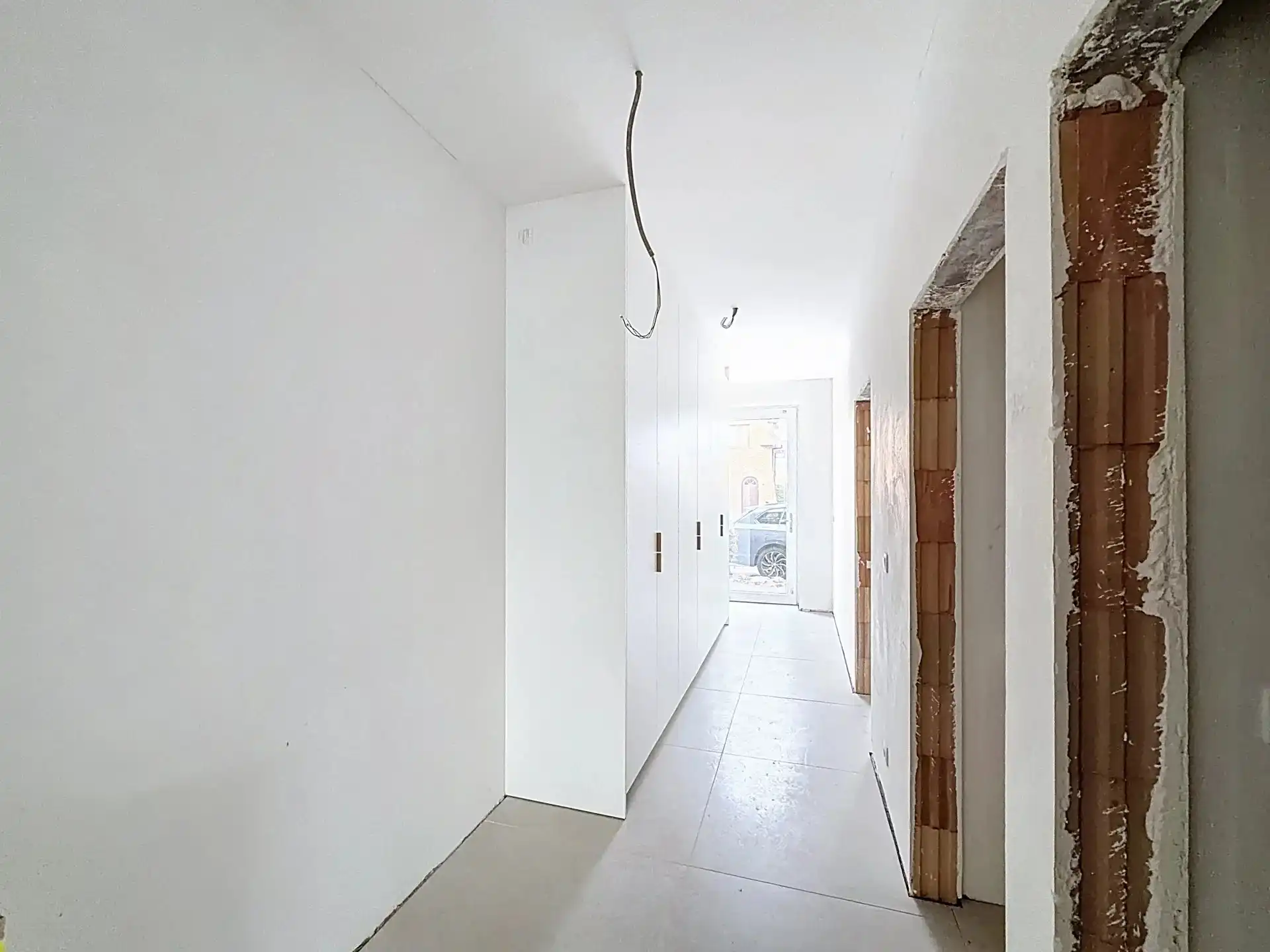 Luxueus en modern afgewerkt gelijkvloers appartement met tuin, 1 slaapkamer en 2 staanplaatsen. foto 12