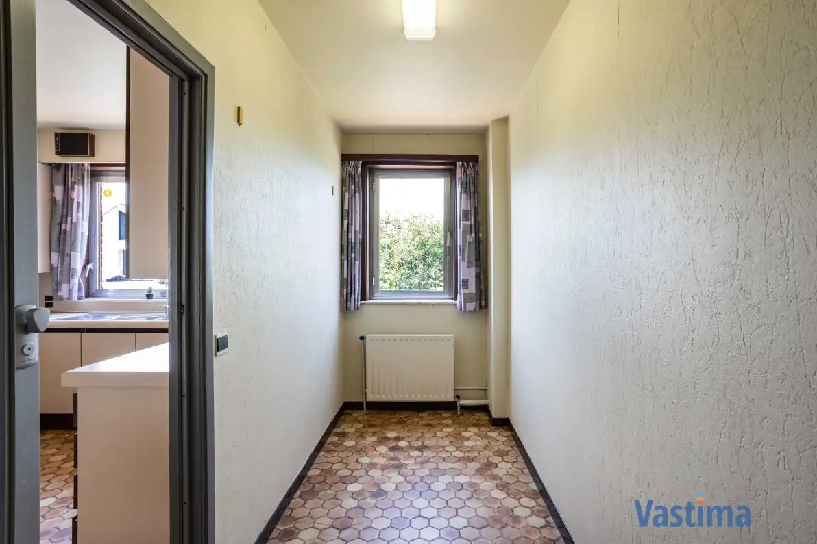 Op te frissen gezinswoning met 4 slaapkamers en zuidwestgerichte tuin foto 10
