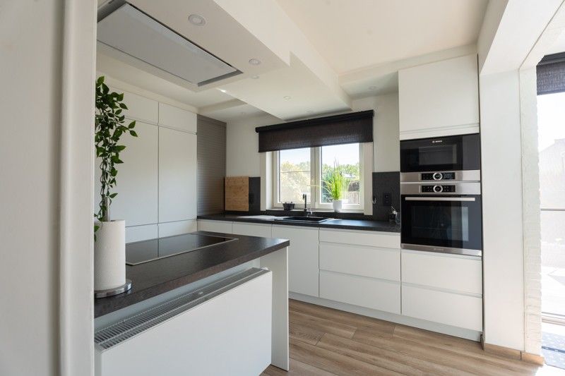 Energiezuinige woonhuis met 3 slaapkamers op een perceel van 6 a en 15 ca. foto 20