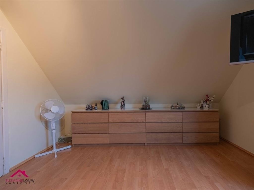 Stijlvolle vrijstaande woning met ruimte voor vrij beroep, garage en verwarmd zwembad op ruim perceel foto 35