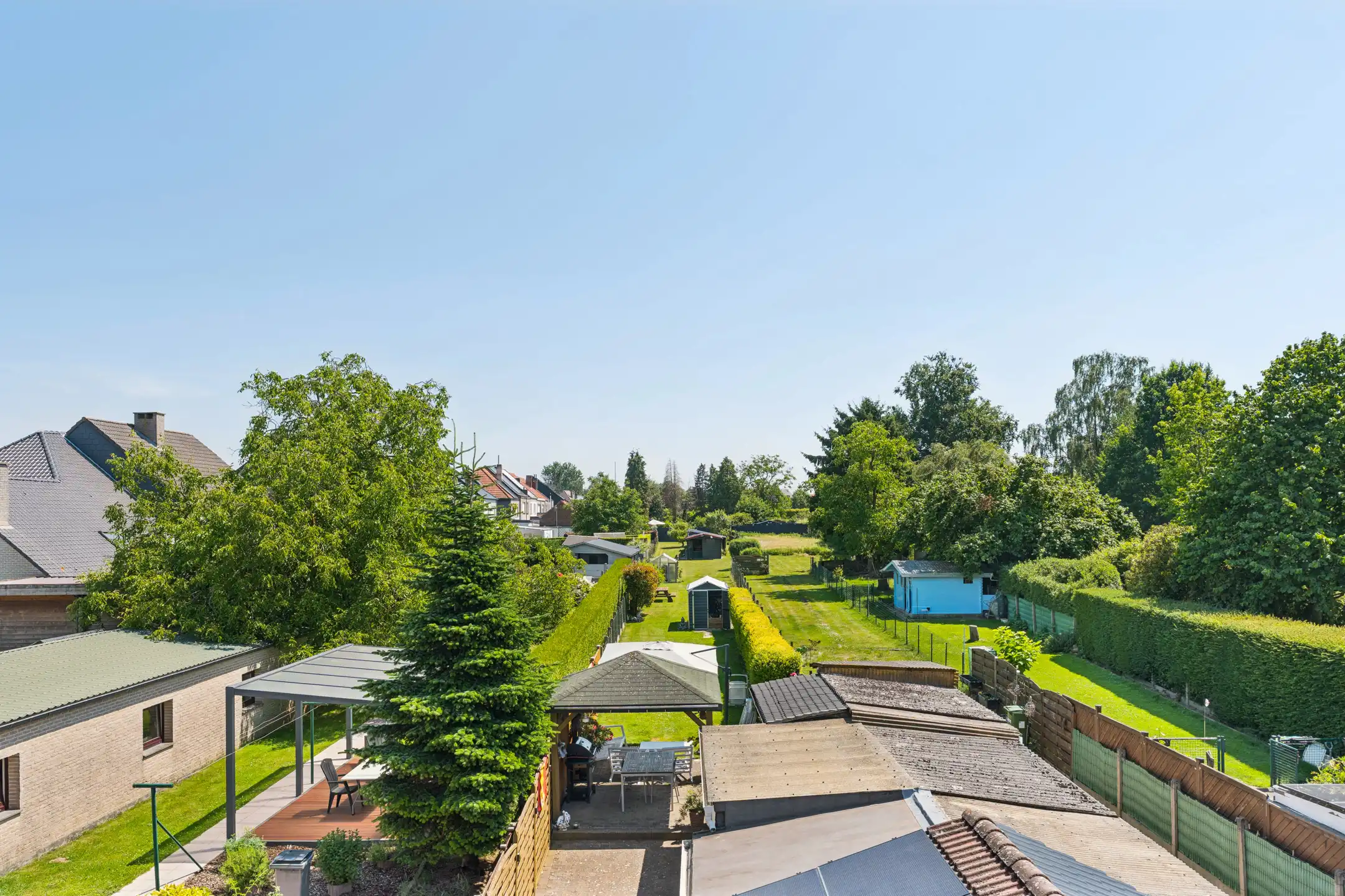 Gezinswoning met 3 slks en uitzonderlijk grote tuin foto 14