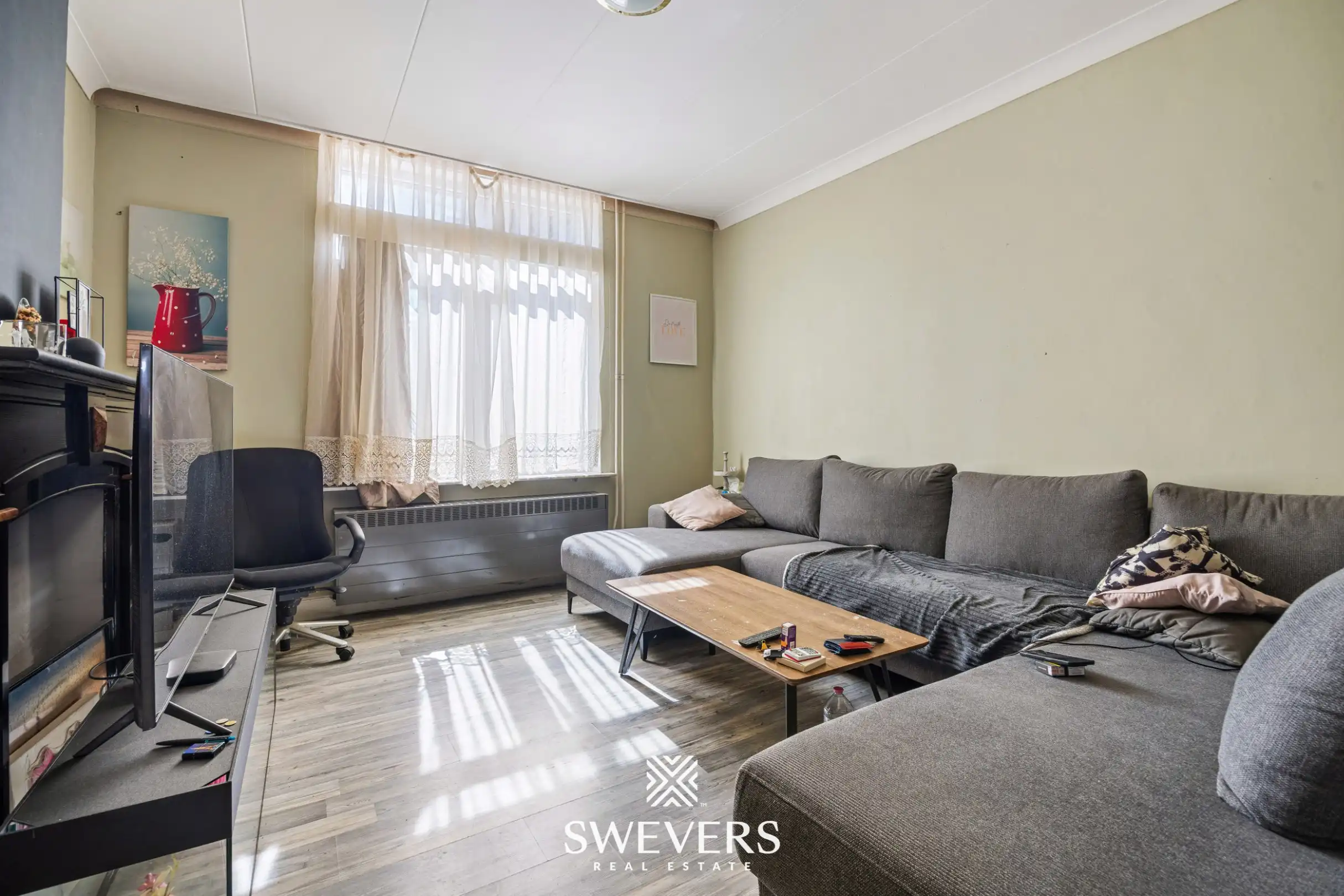 Gerenoveerd investeringspand met 2 verhuurde appartementen te Leopoldsburg foto 6
