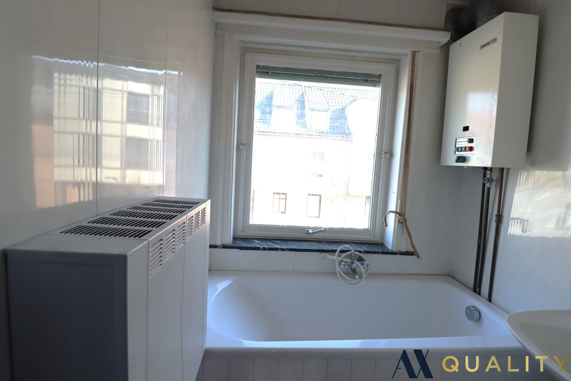 Te renoveren woning in het centrum van Bornem foto 12