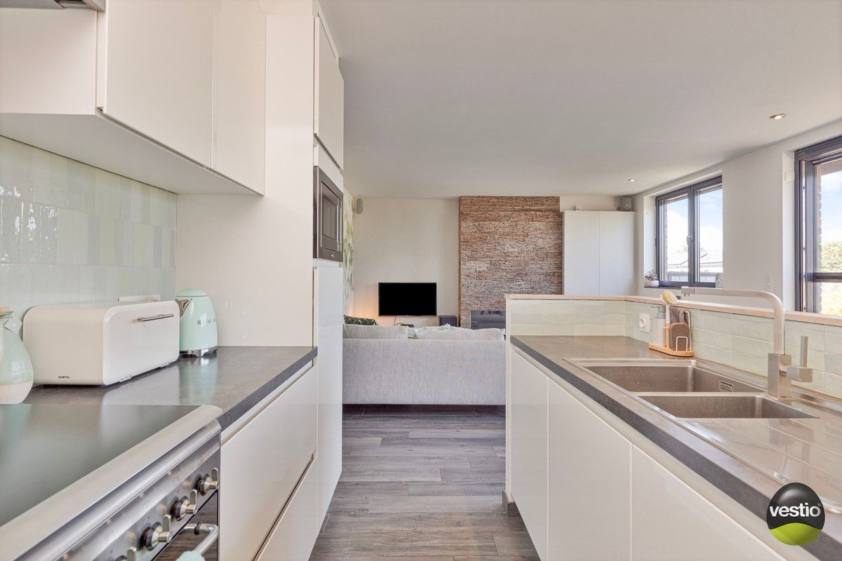 FLEXIBEL DUPLEX APPARTEMENT VAN 183M² MET 5 SLAAPKAMERS MET ZORG- EN WOONOPLOSSING NABIJ CENTRUM TONGEREN. foto 11