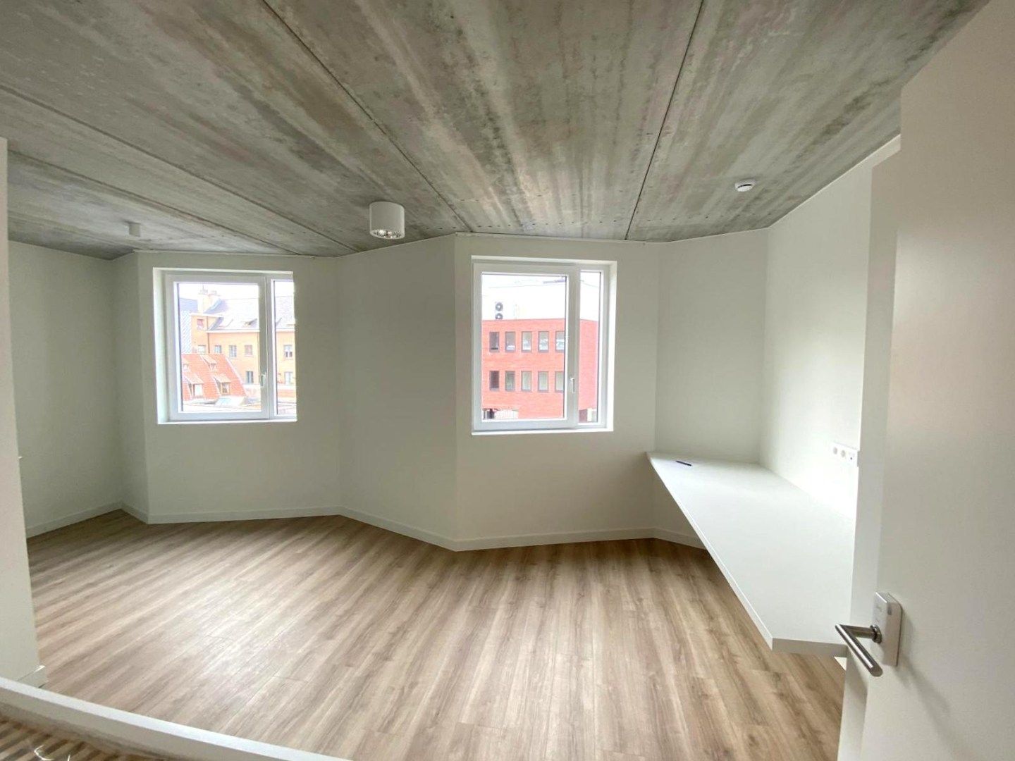 Studentenkamer (25,5 m²) te koop in "Residentie Amand 47" op het Sint-Amandsplein te Kortrijk foto 2