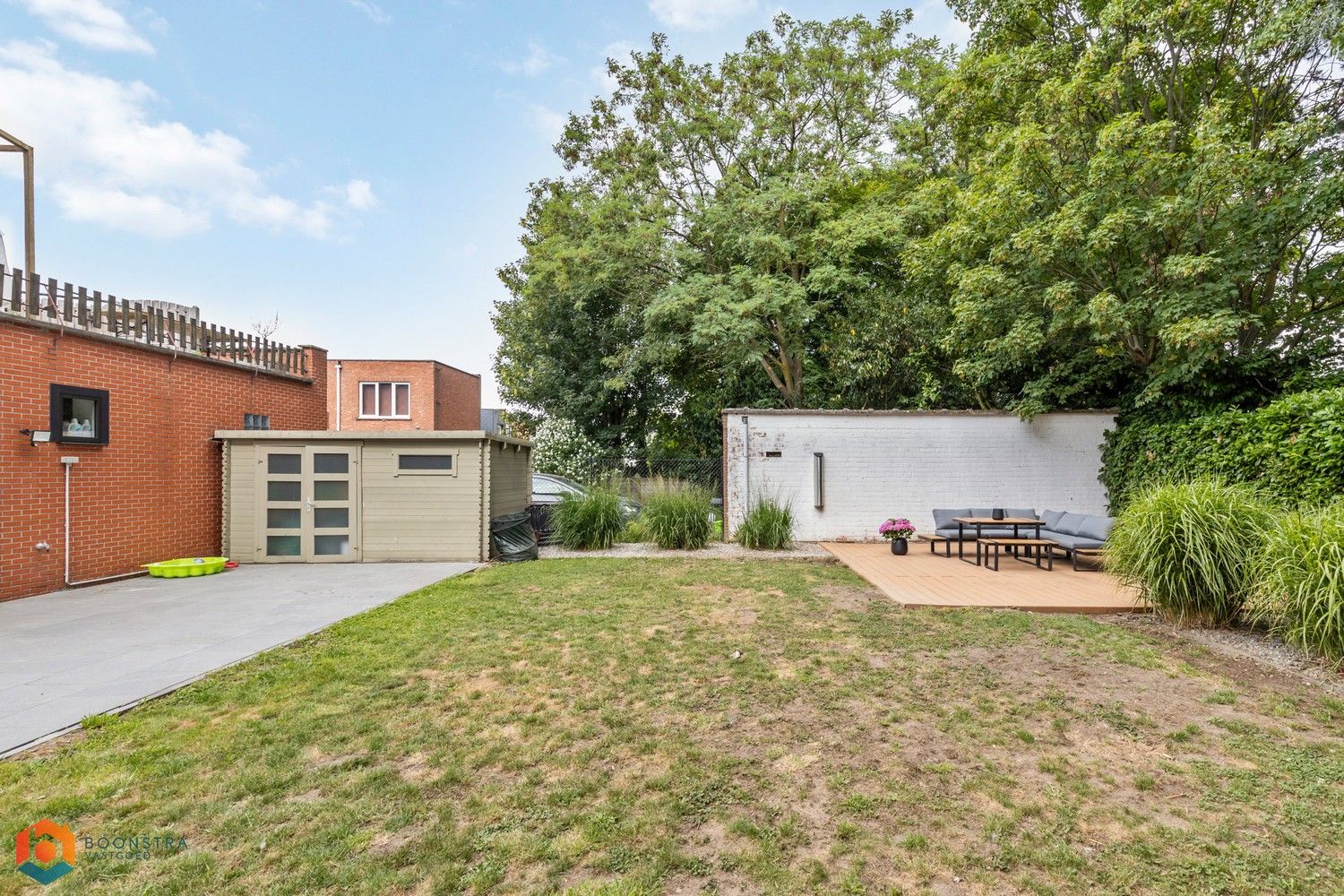 Gelijkvloers app. met 2 slpkrs, ruime tuin en garage foto 14