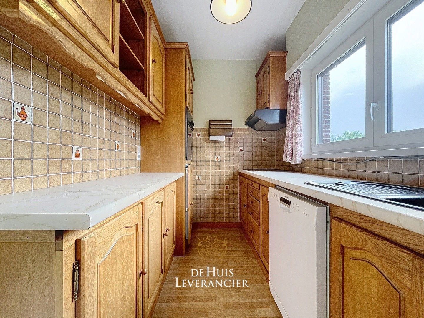 Een huis met potentieel in een buurt met toekomst ! foto 14