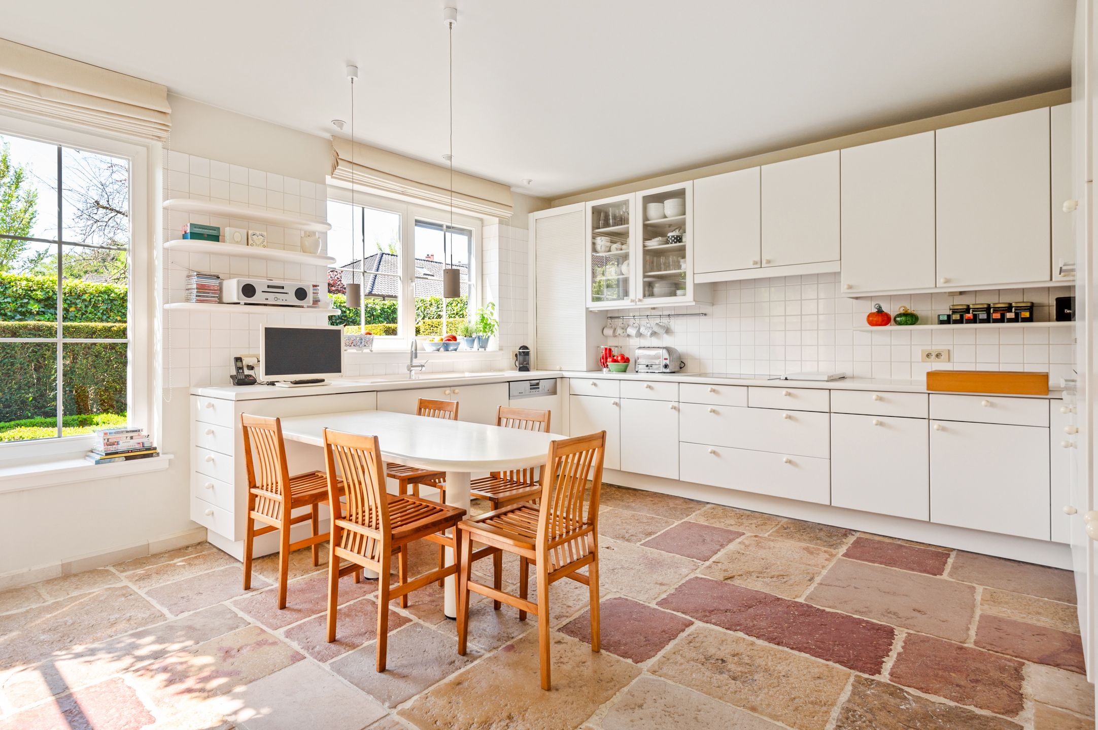 Heel ruime woning met mooie tuin op toplocatie! foto 7