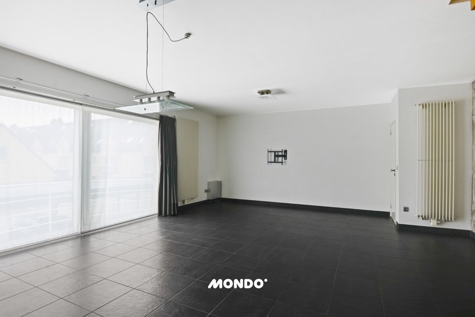 Ruim en energiezuinig duplexappartement te koop in het centrum van Steenhuffel – Inclusief overdekte privéparking foto 5