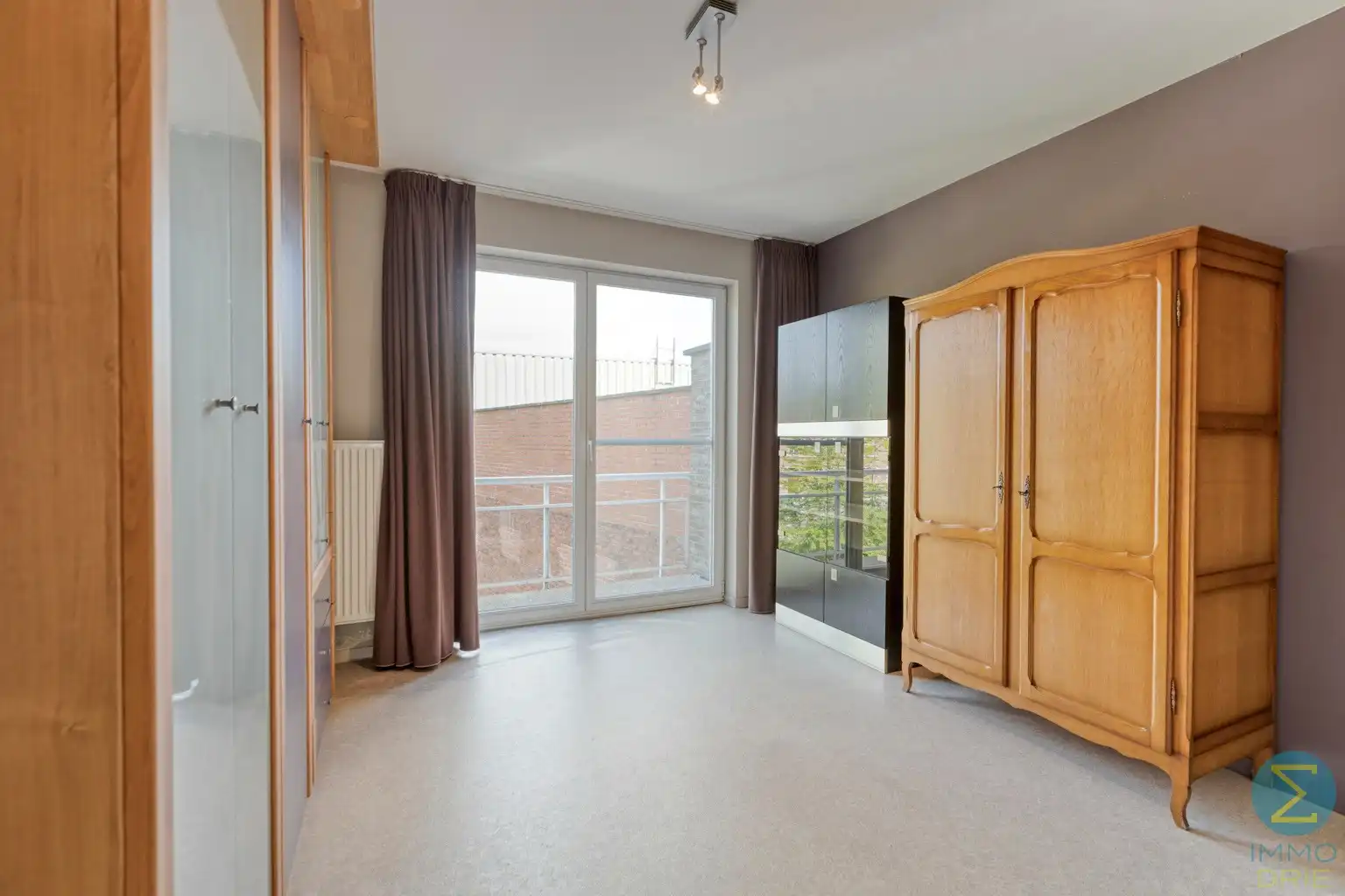 Ruim 2-slaapkamerappartement met balkon, garage én kelder  foto 14