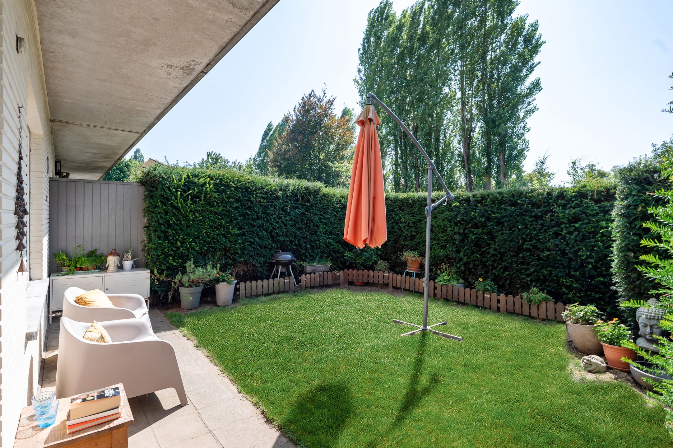 Mooi gelijkvloers appartement met 2 slk., tuin en garagebox foto 12