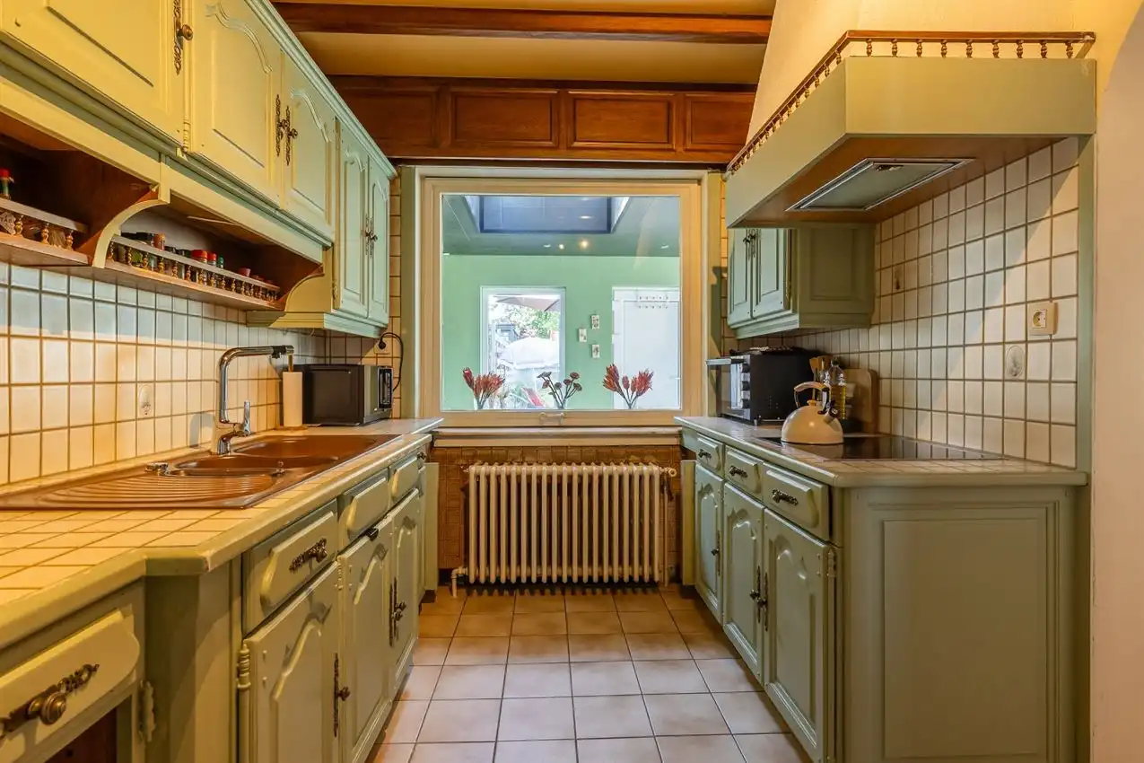 Ruime retrowoning met EPC C,  zuidtuin en achterliggende toegang. foto 36