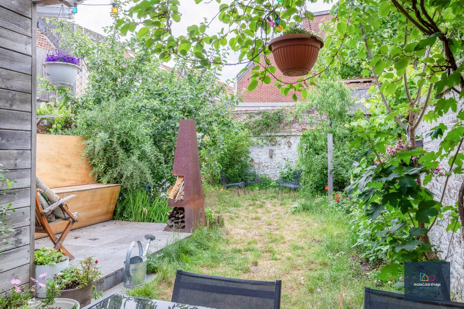 Instapklare woning met aangename tuin en garage foto 21