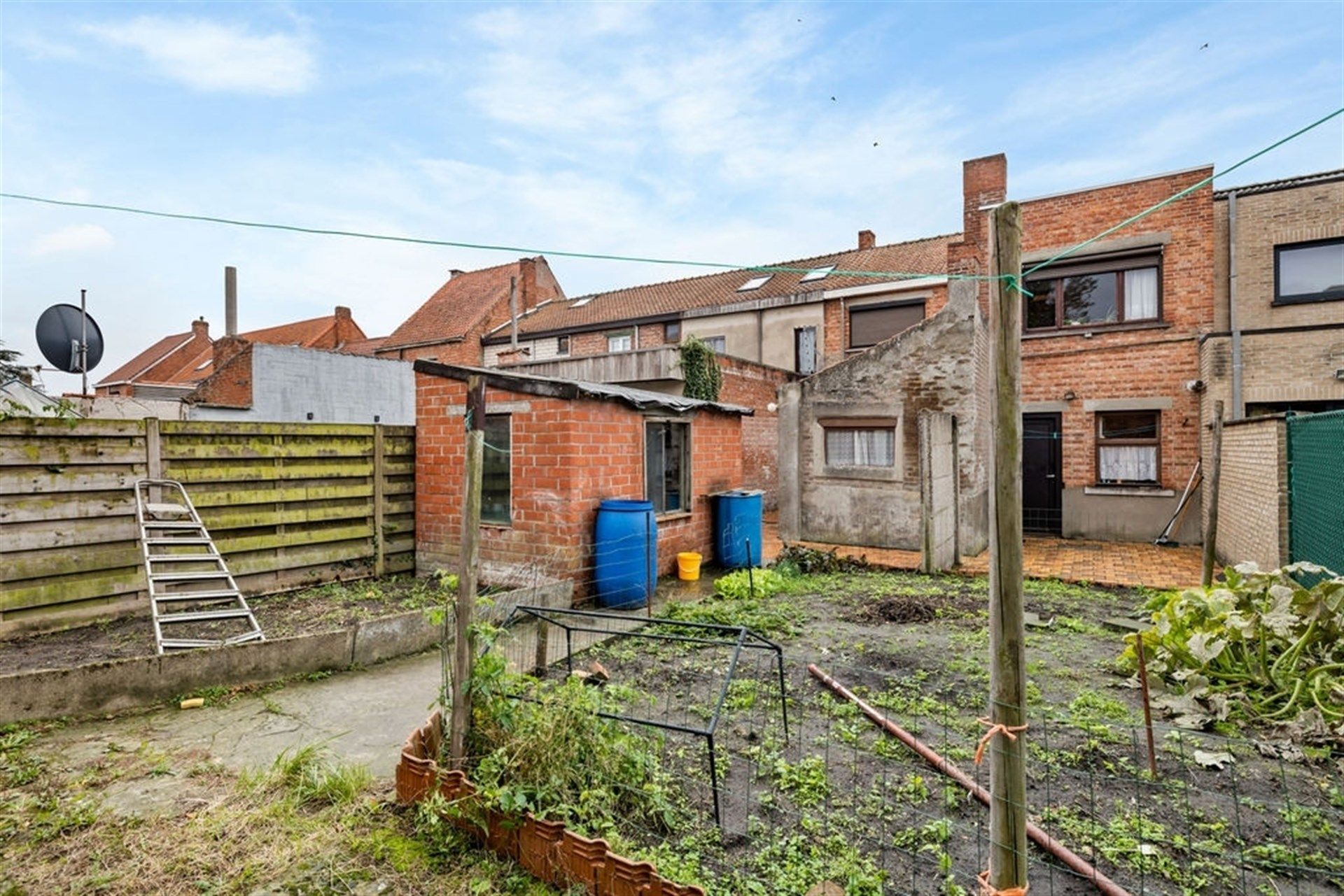Potentiële gezinswoning of 2 bouwgronden in het hartje van Sint-Gillis-Waas foto 23