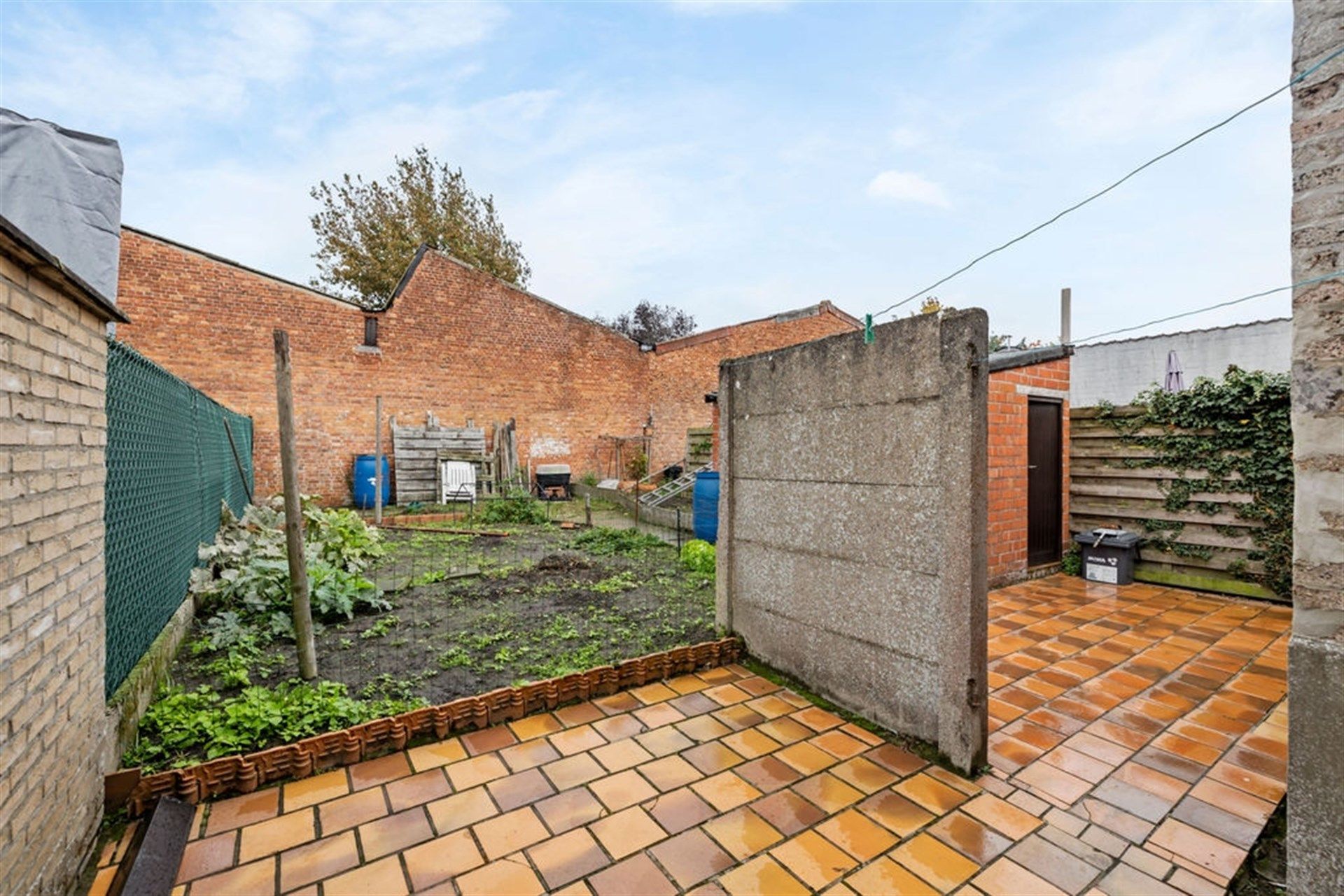 Potentiële gezinswoning of 2 bouwgronden in het hartje van Sint-Gillis-Waas foto 23