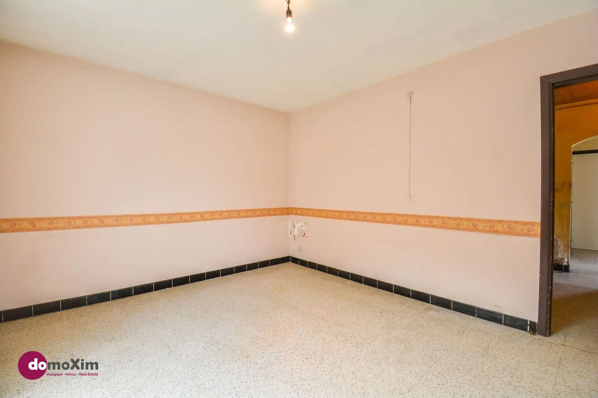 Te renoveren woning met garage in Boortmeerbeek foto 9