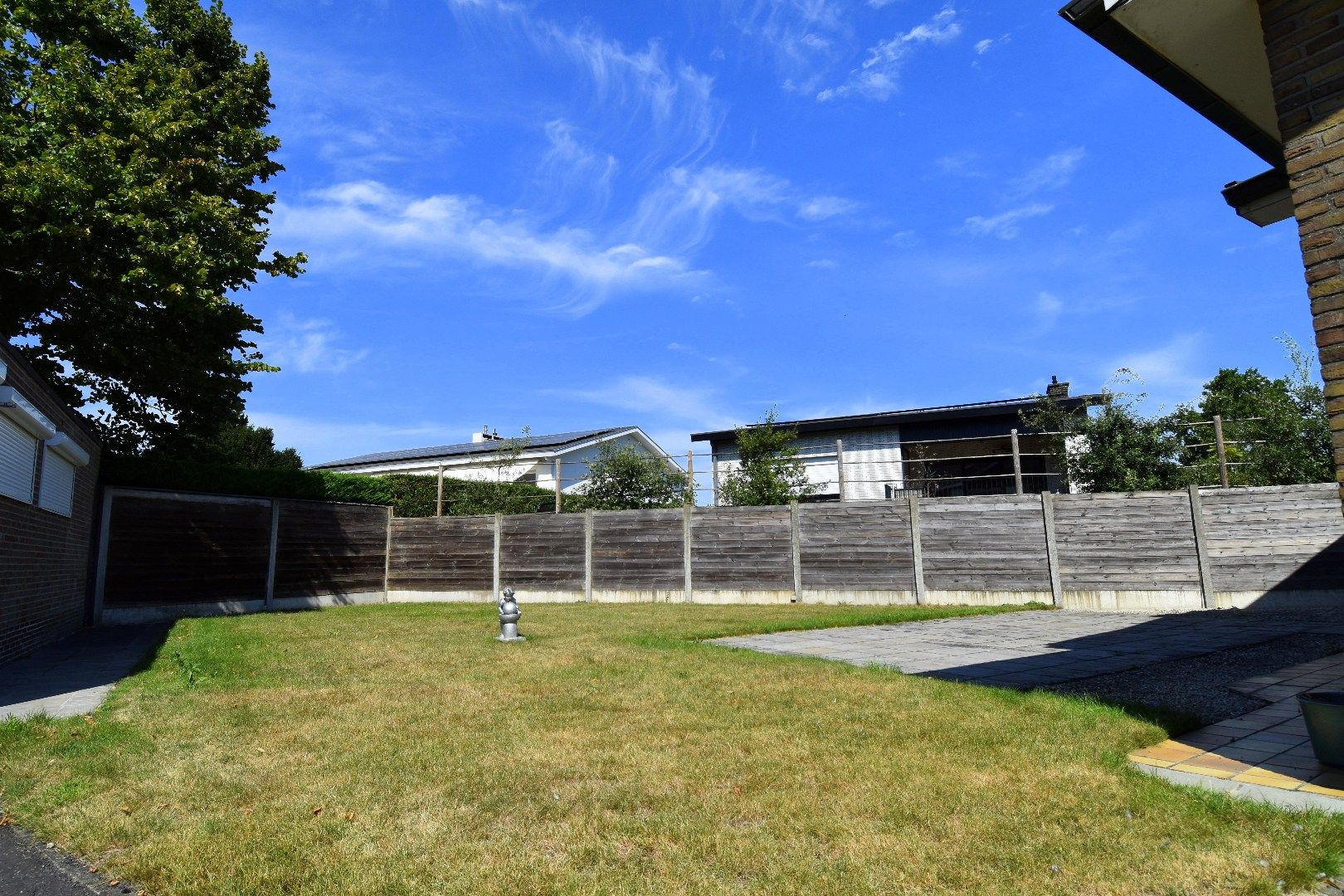 Alleenstaande bungalow met tuin en garage te koop op een bereikbare locatie te Harelbeke foto 3