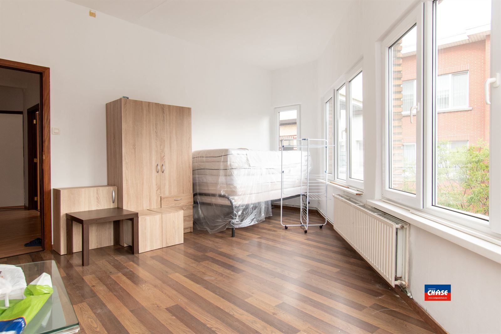 Hoekwoning met 6 slpk - ingericht als 3 units foto 2