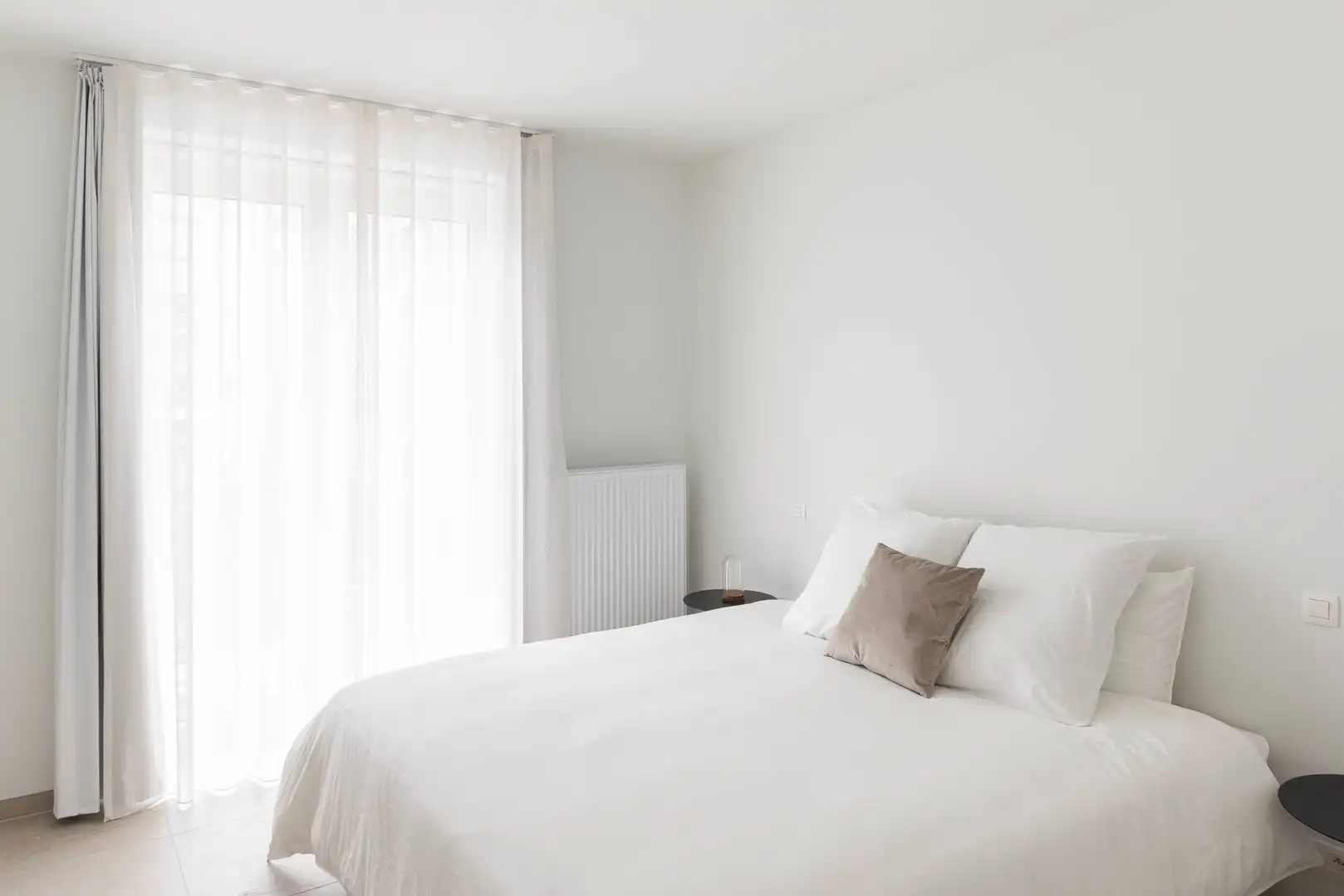 Lichtrijk recent instapklaar appartement met 2 slaapkamers, zonneterras, parking en ruime kelderberging foto 10