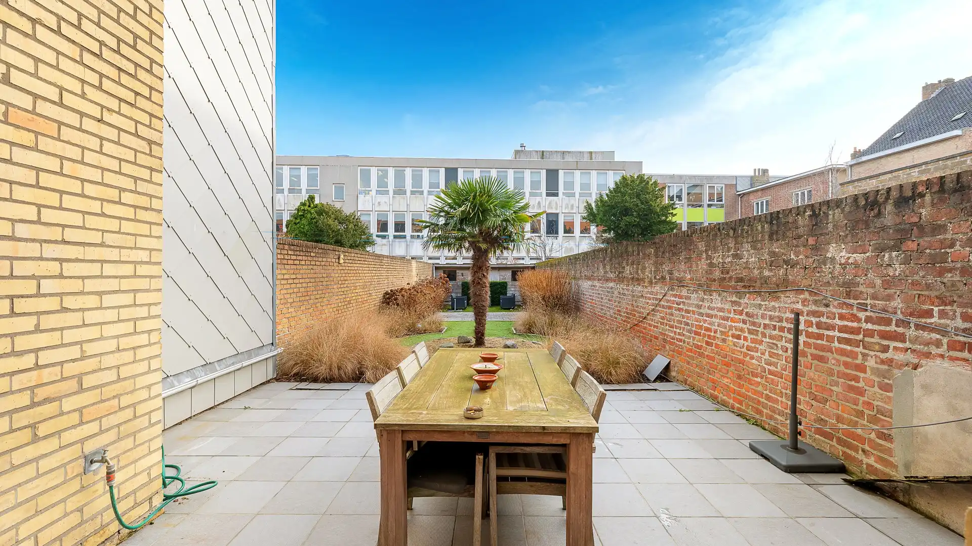 Instapklare woning met zonnige tuin in het centrum van Heist foto 13