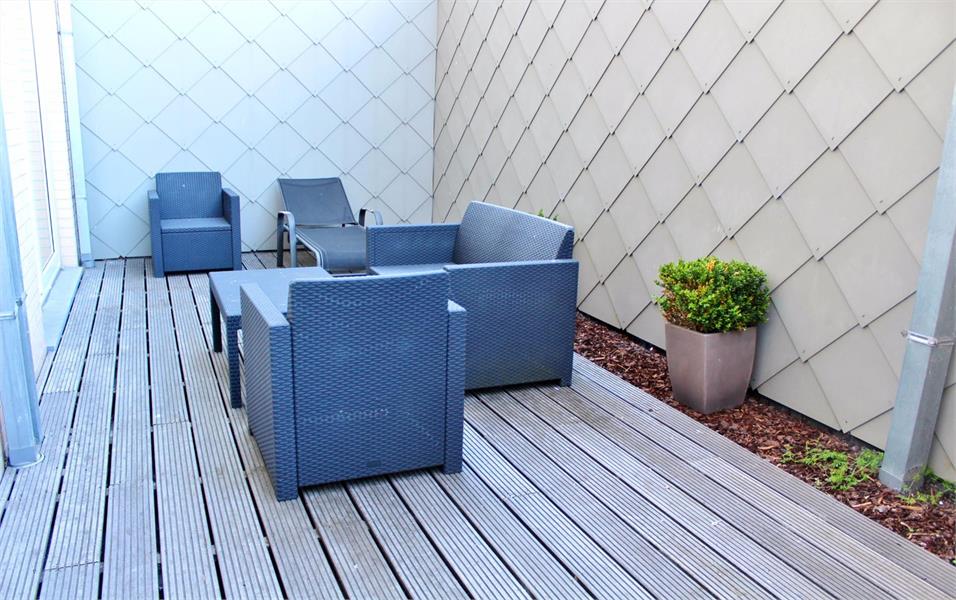 Mooi gelijkvloers appartement met terras en garagebox! foto 4