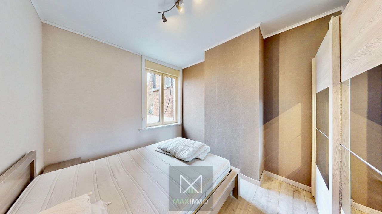Instapklare gezinswoning met diepe tuin in Menen – Ruimte, licht & comfort foto 11