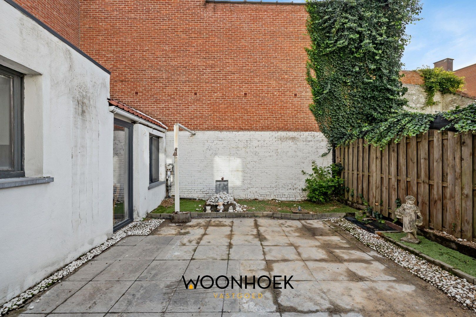 Ruime woning in centrum Waasmunster  foto 17