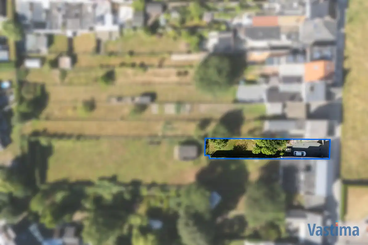 Perceel grond nabij centrum Erembodegem met zuidgerichte tuin foto 2