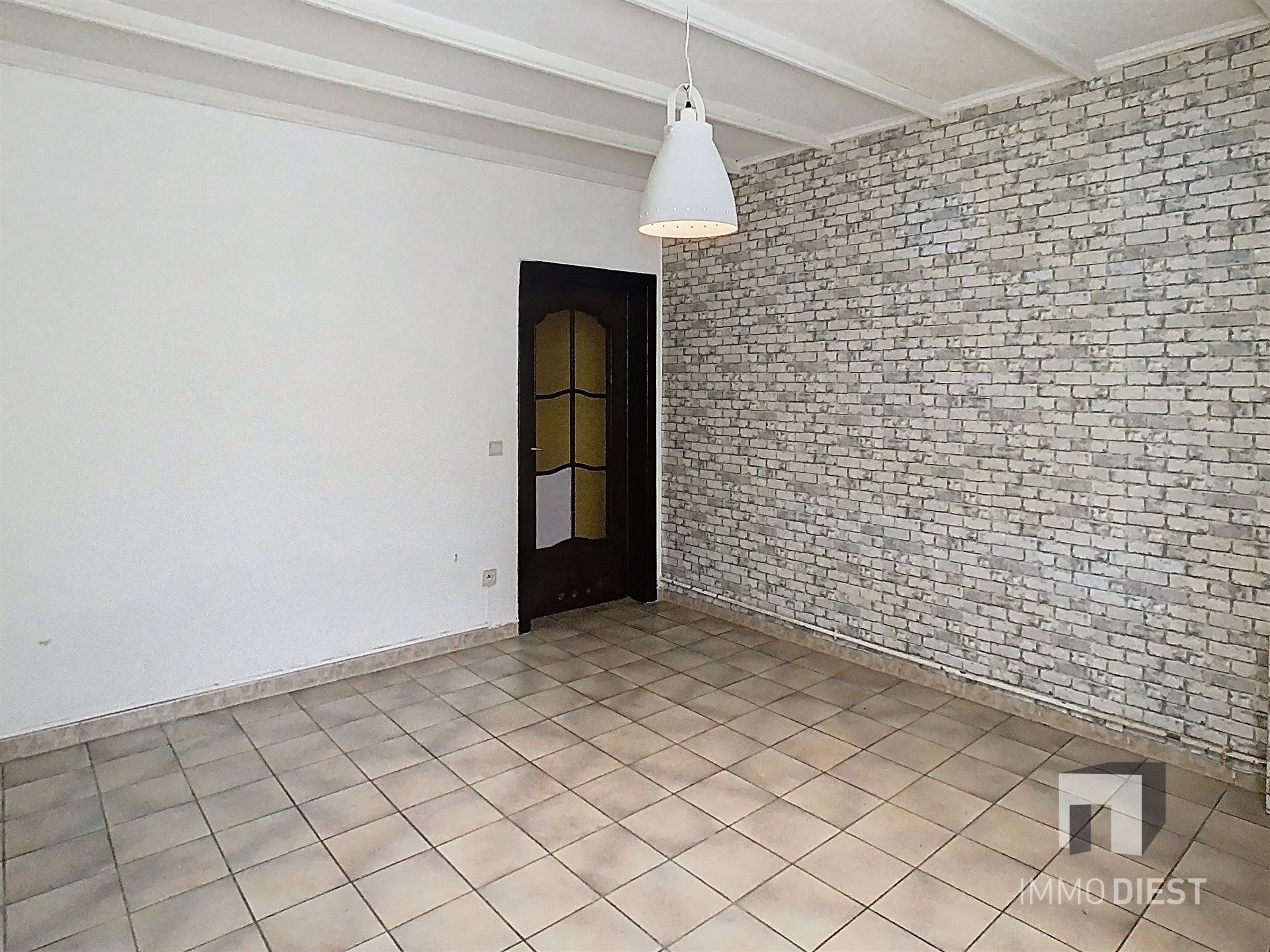 Gezellige rijwoning met terras en tuin foto 3