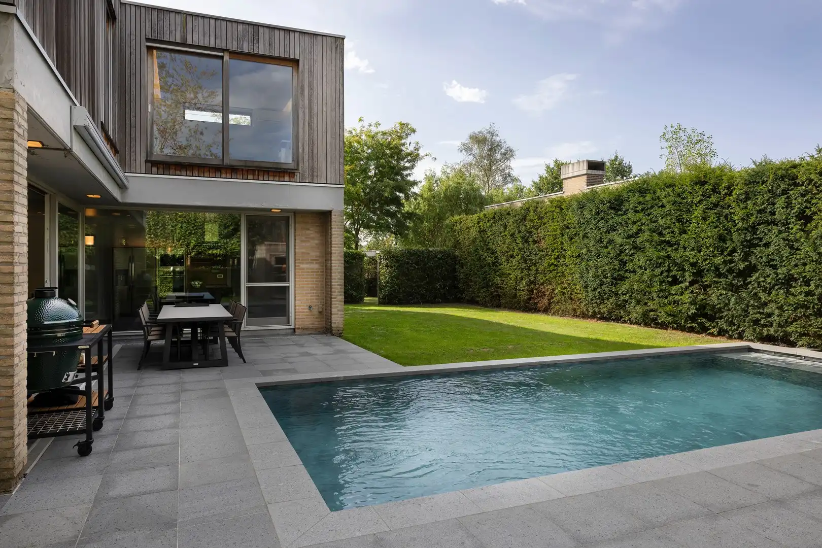 Subliem gelegen, stijlvolle woning met zwembad. foto 13