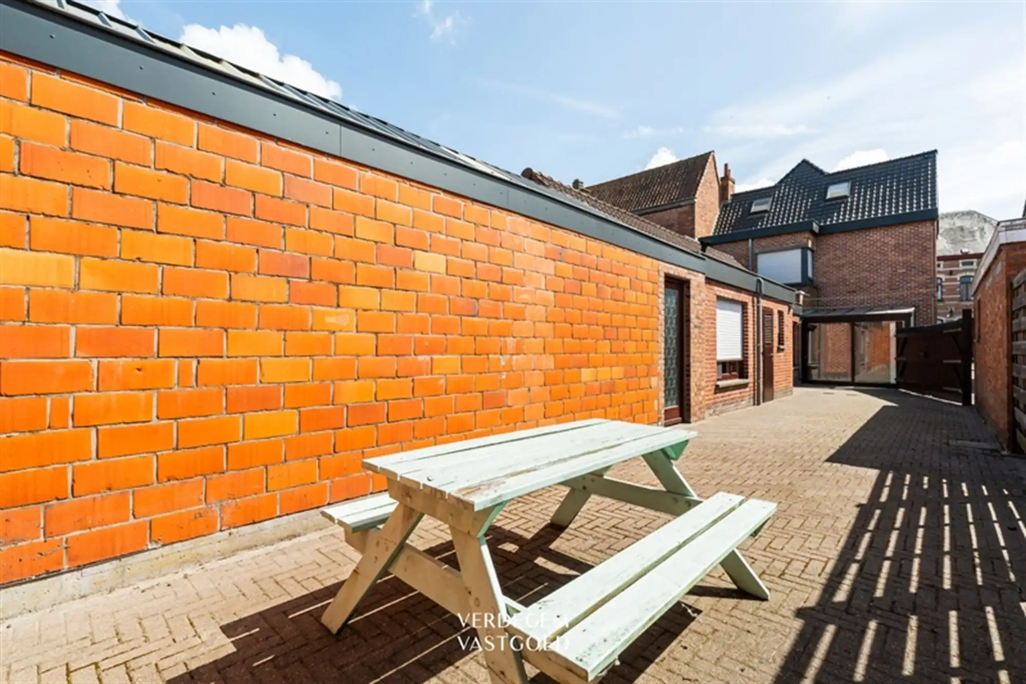 Opbrengsteigendom met 2 appartementen en 4 garages in het centrum van Sleidinge  foto 29