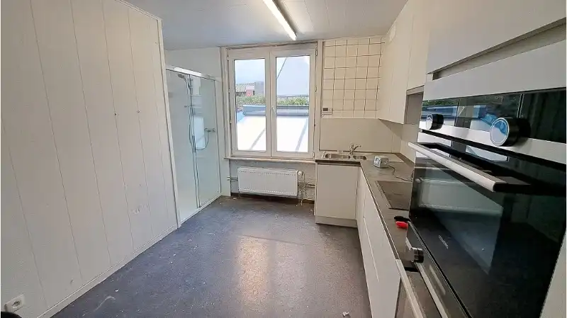 Opbrengsteigendom te koop in de Ezelstraat in Brugge foto 10