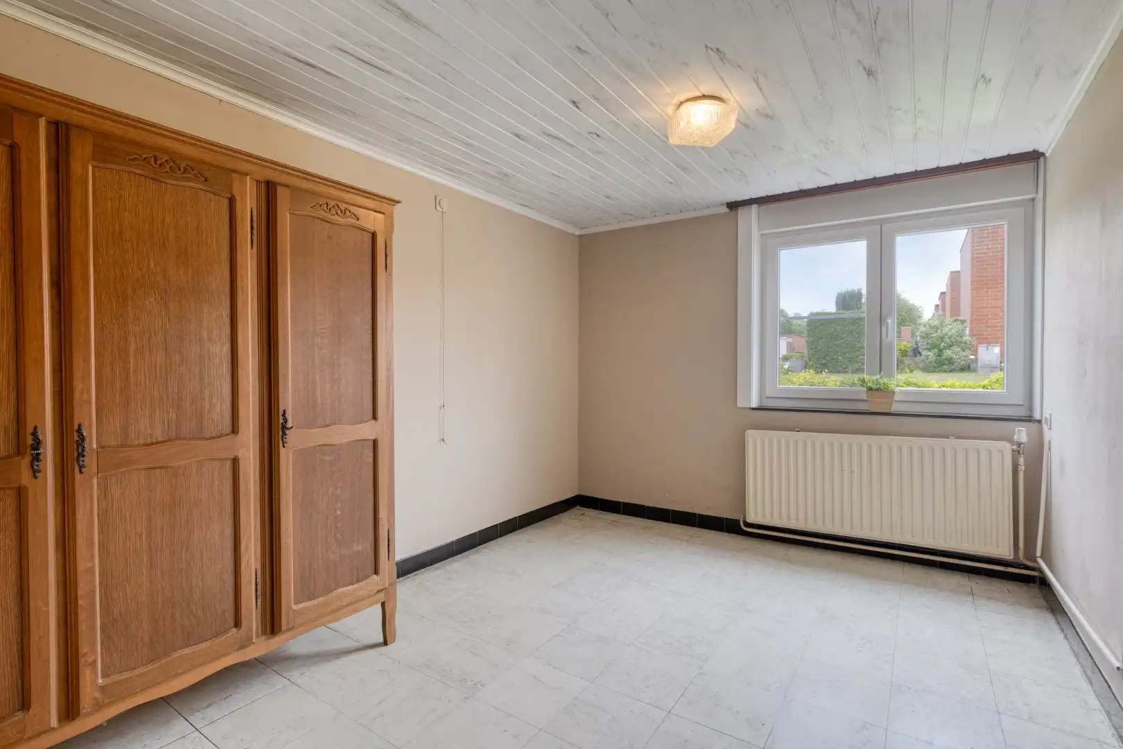 Rustig gelegen gelijkvloerse woning met 3 slaapkamers, garage en zonnige buitenruimte! foto 8