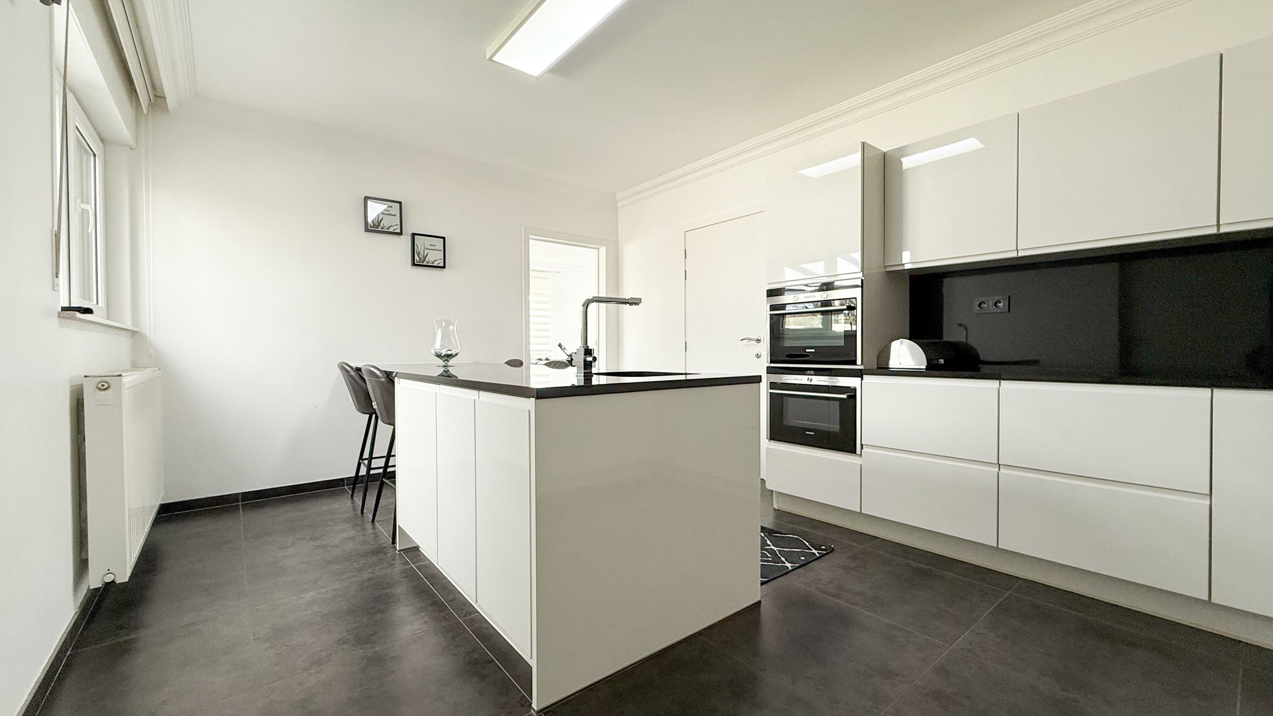 Instapklare woning met 4 spks en volledig aangelegde tuin! foto 13