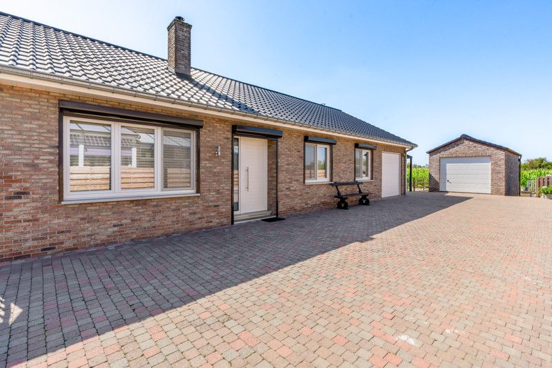 Zeer rustig gelegen woning op net geen 10are foto 3