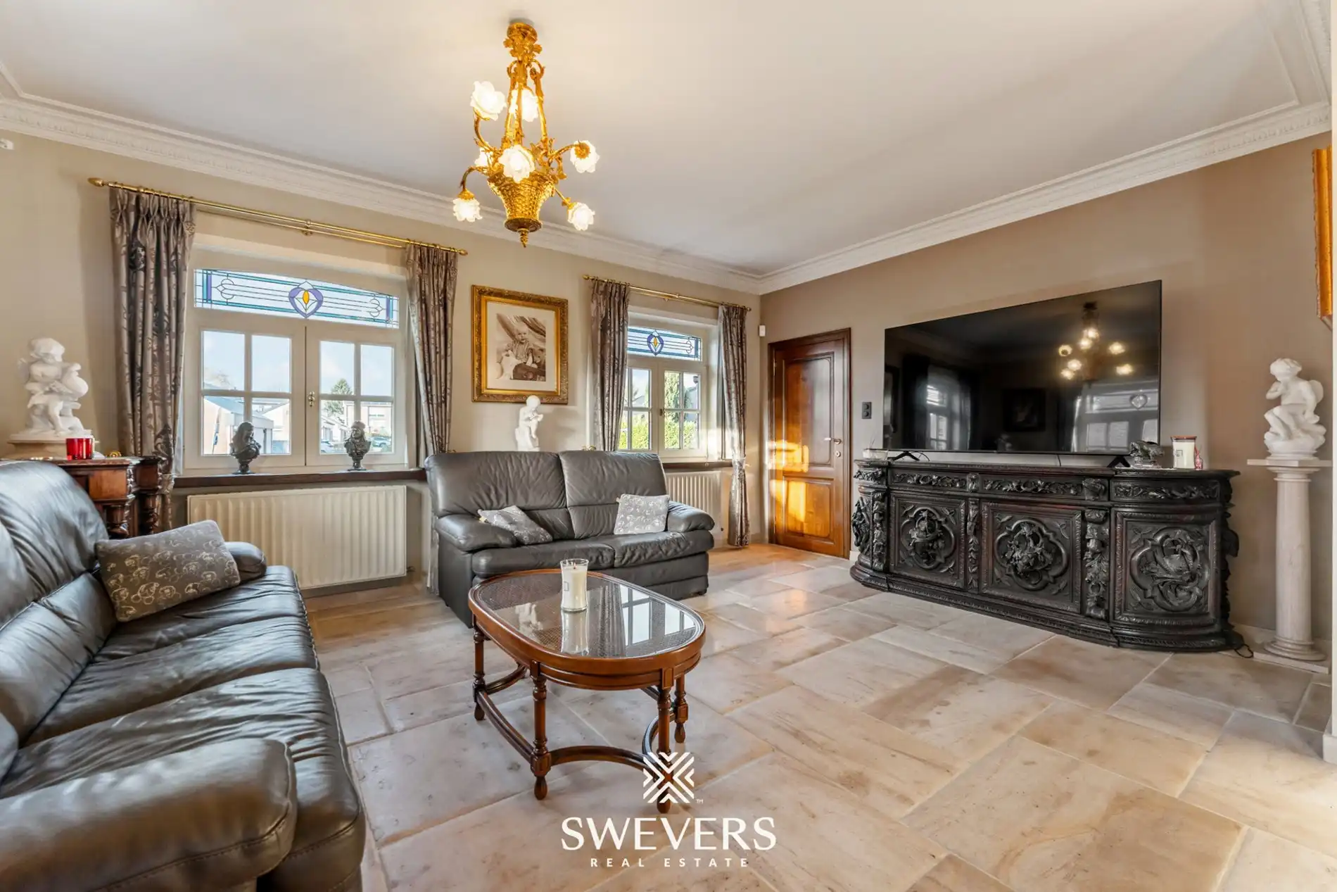 Ruime open bebouwing met 4 slaapkamers en zonnige tuin in Houthalen foto 2