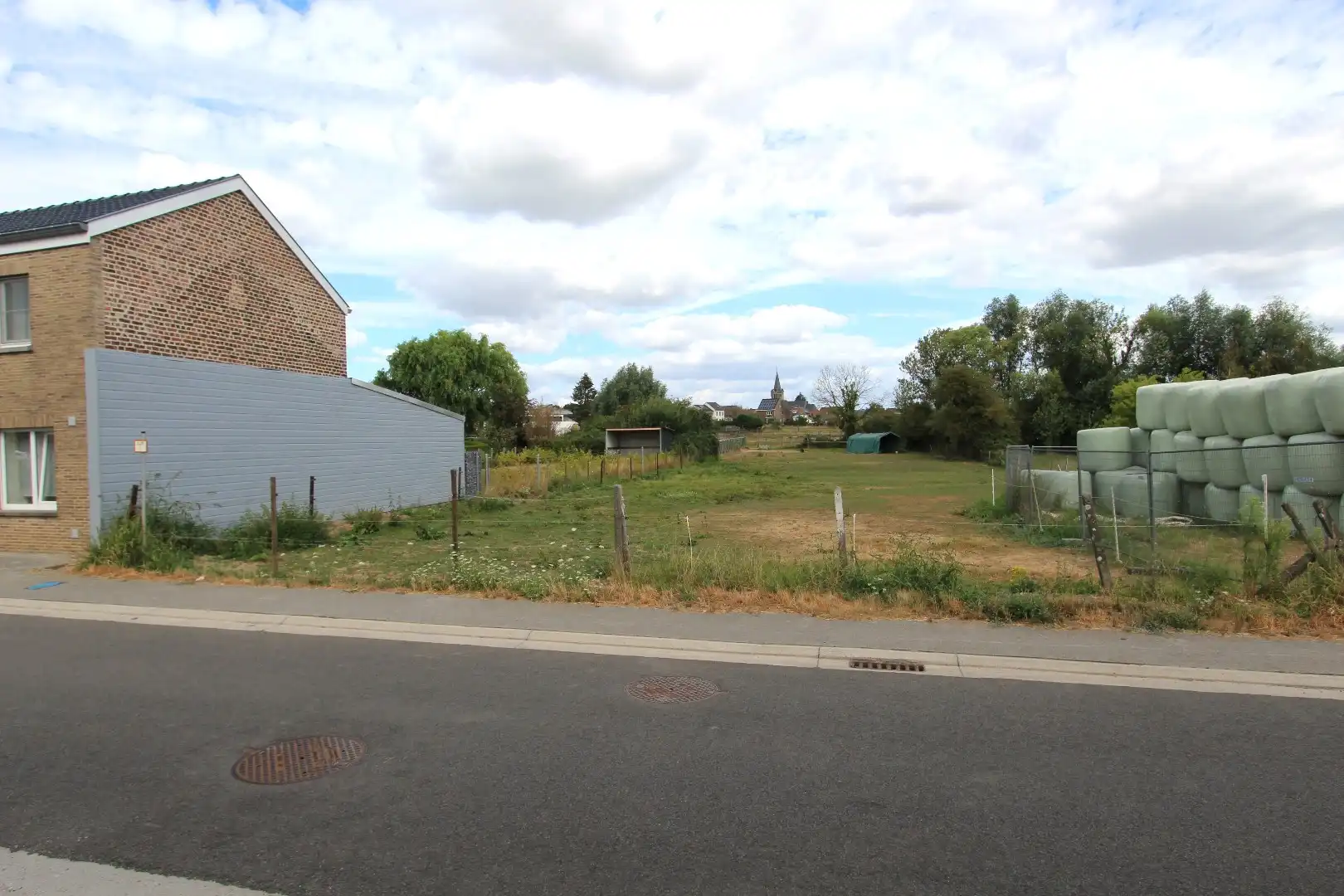 Perceel bouwgrond met diepe tuin - landelijk gelegen in Borgloon-Jesseren foto 4