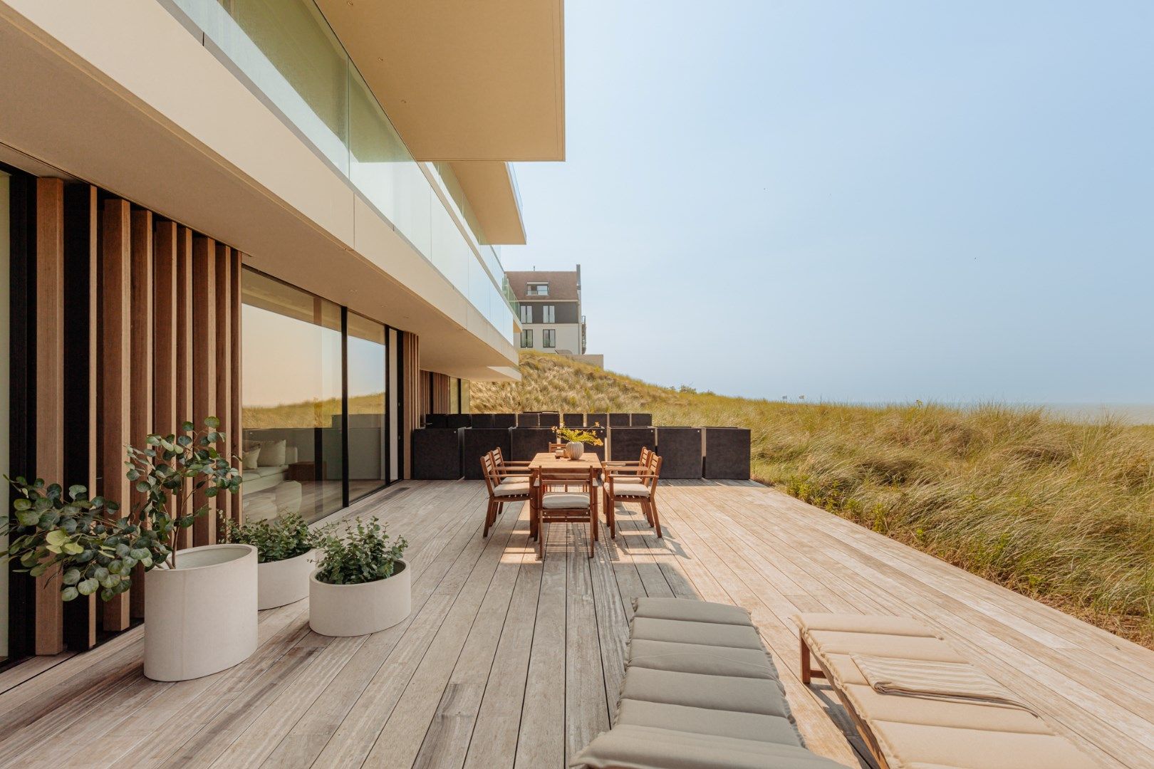 Uiterst smaakvol en top-notch afgewerkt appartement met frontaal zeezicht van het gelijkvloers terras - Residentie Blanke Top foto {{pictureIndex}}