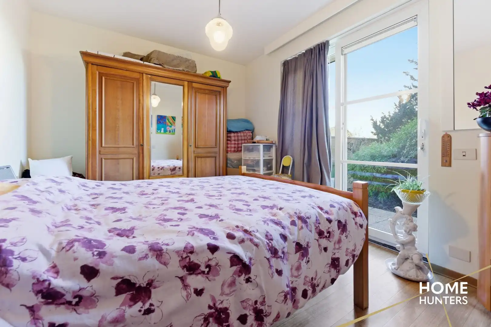 Instapklaar gelijkvloers appartement met 2 slaapkamers en ruime tuin foto 14