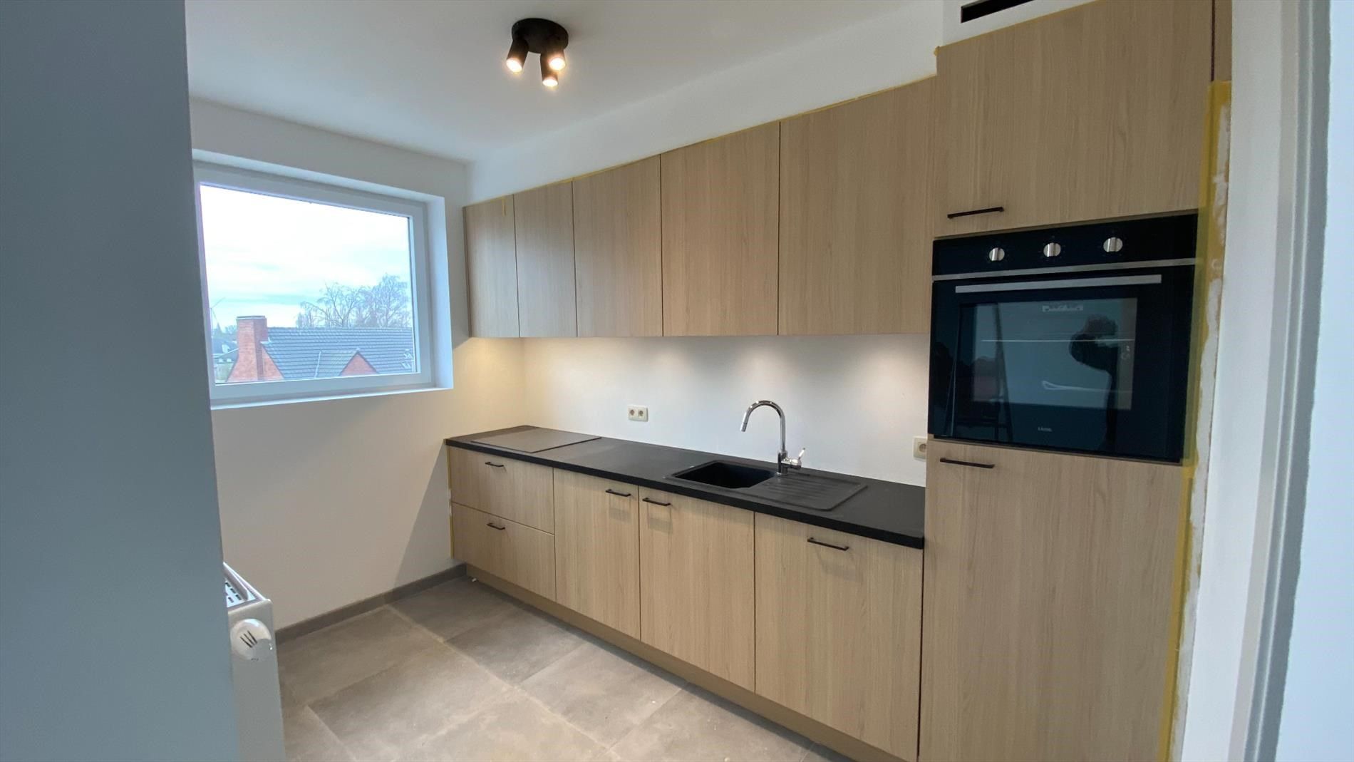 Verzorgd appartement met terras en garage te Lokeren foto 2