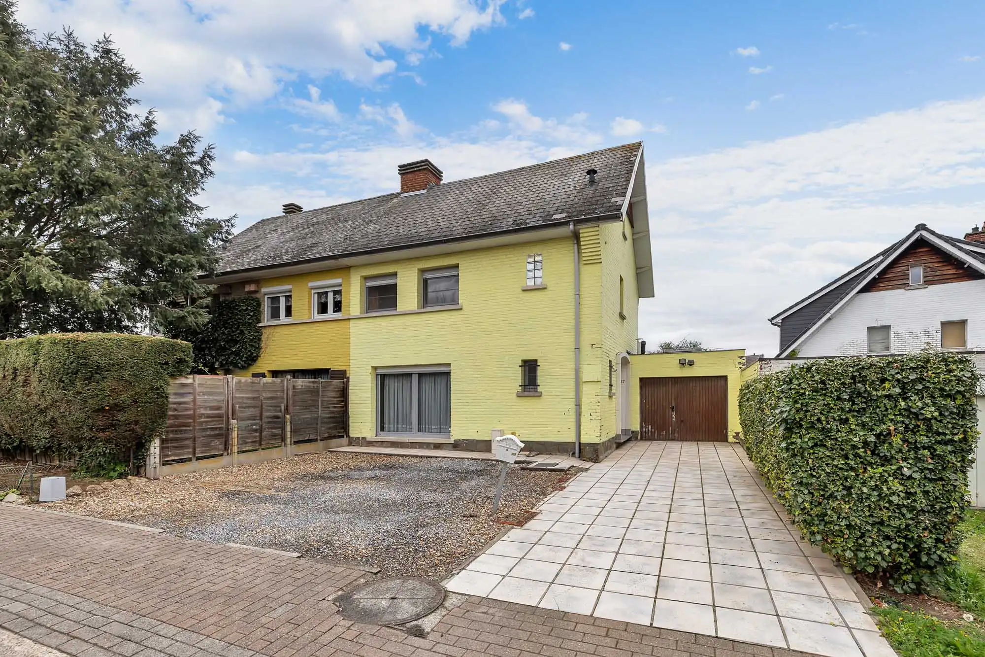 Hoofdfoto van de publicatie: Halfopen bebouwing met garage en tuin in Ternat!