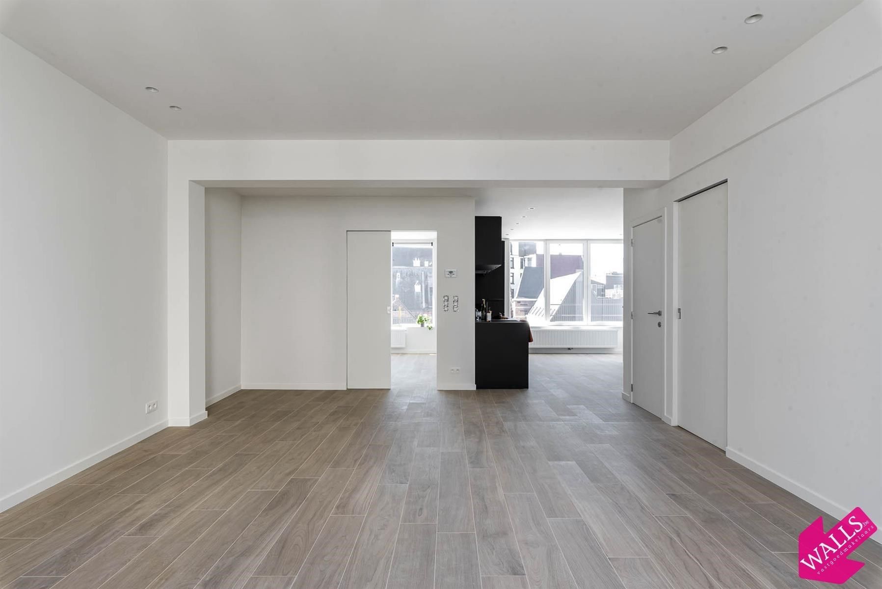 Luxueus gerenoveerd appartement op topligging foto 2
