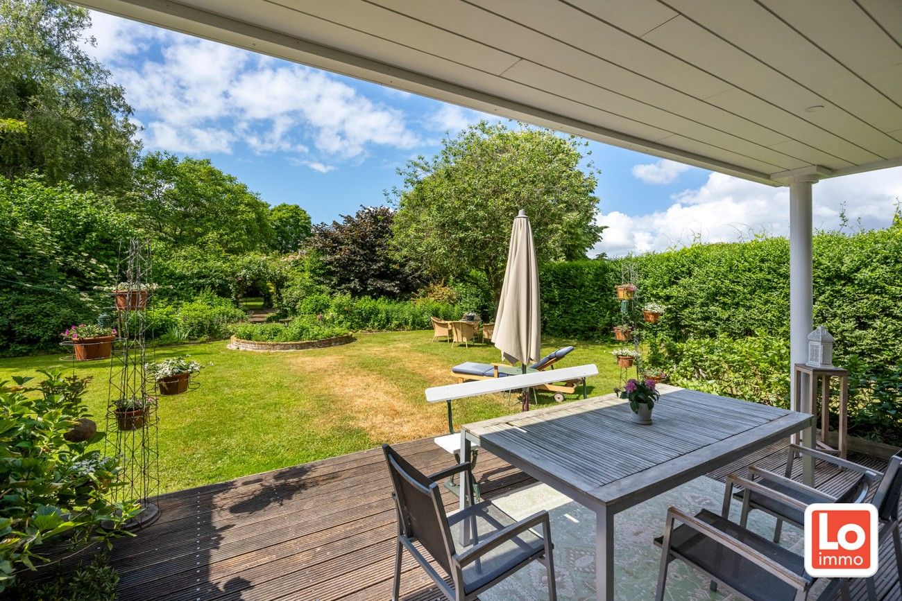 Charmante open woning met carport en héél grote aangename tuin gelegen op een toplocatie vlakbij het centrum van Zaffelare! foto 6